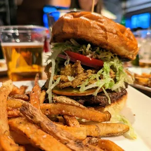 Steakhouse Burger. $14.50. House-ground beef, Gouda, crispy onions, Sriracha steak sauce, LT, red onion, house pickles, peppercorn mayo.