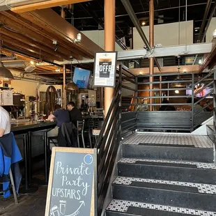 stairs leading up to the bar