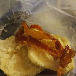 A bacon biscuit with a slice &amp; a half of half done bacon is unacceptable. Never had this problem before. Better luck next time