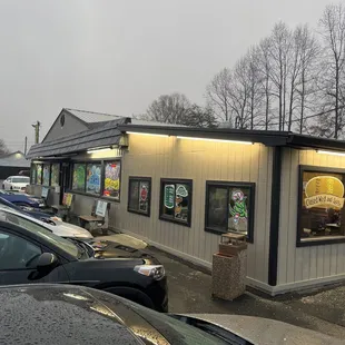 cars parked in front of the restaurant