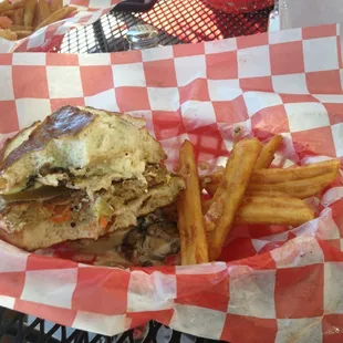 Veggie burger on pretzel bread.