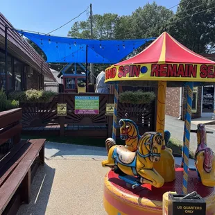 a carousel with a tiger on it