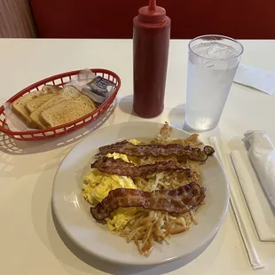 Breakfast Special   2 scrambled eggs bacon hash browns and toast