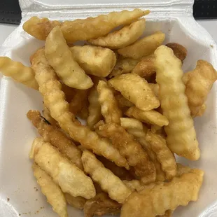 Old, burnt fries!  YOU SHOULD BE ASHAMED OF YOURSELVES FOR SELLING THIS TO YOUR CUSTOMERS.