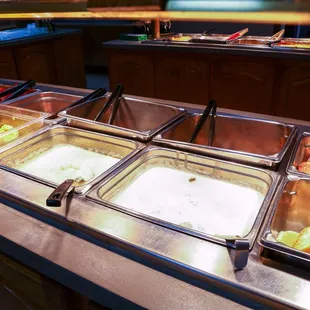 a buffet with a variety of food items