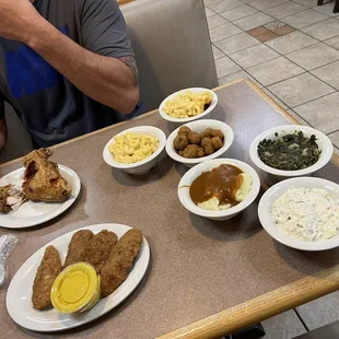 a man eating a meal at a restaurant