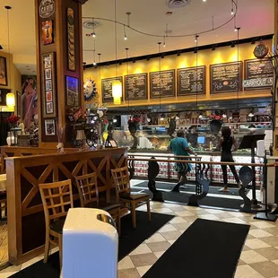 The front area as you enter . Beautiful interior and great service.