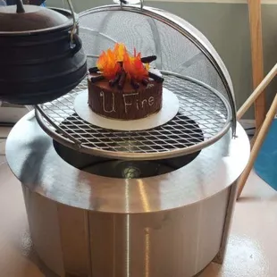 Fire cake in a fire pit in the store.
