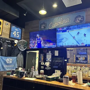 hockey jerseys hanging on the wall