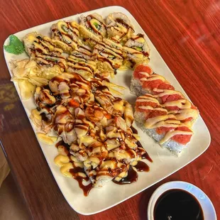 a plate of sushi and a cup of coffee