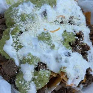 Their nacho supreme... wished the cheese wasn't shredded. Barely any underneath all of the sour cream and liquid guac