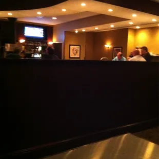 View of the lower seating area and bar from my booth.