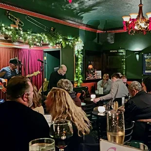 a crowd of people sitting at tables