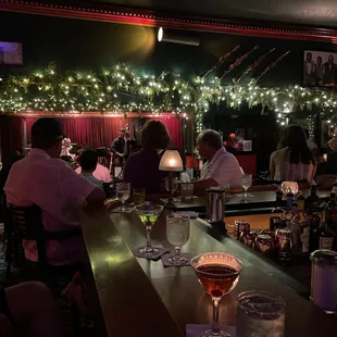 people sitting at the bar