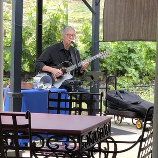 a man playing a guitar
