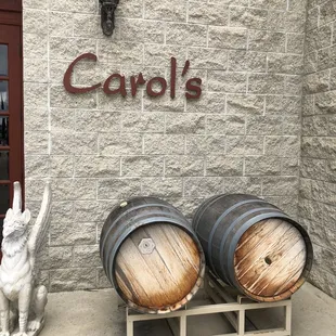 a rabbit statue and barrels