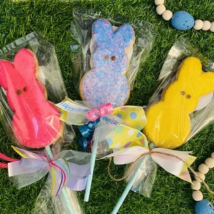a group of decorated easter cookies