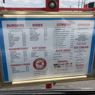 a menu for burgers and shakes