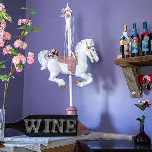 wine bottles and flowers in vases