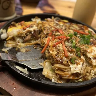 OMG Hiroshima Okonomyaki! Loved mild flavor. Chew yaki soba and chew pancake, Absolutely delicious.