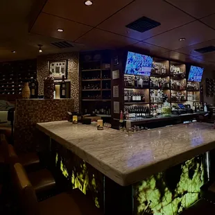 a bar with a marble counter top