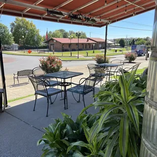 tables and chairs on the patio