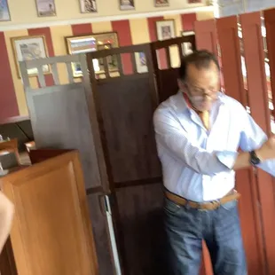 The owner/manager opening the door instructing me to leave.