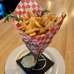 Truffle Parmesan Fries with truffled olive oil, grana padano, herbs, rosemary aioli