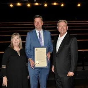 Mayor David Holt congratulates Artistic Director, Rhonda Clark and Board Chair, Rick Lippert, on CST's 40th Season and new venue.