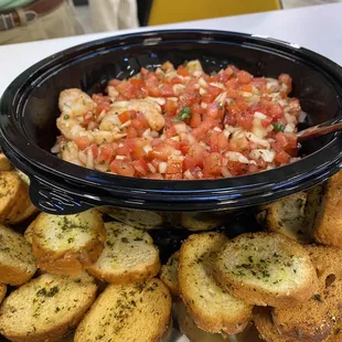 Grilled shrimp bruschetta with crostini