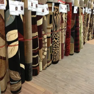 Over 100 area rugs, (5&apos;3&quot;x7&apos;6&quot;). All 50% off.. . . .
