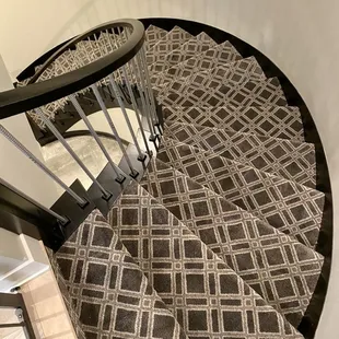 Custom carpet pattern! Curved staircase installation.