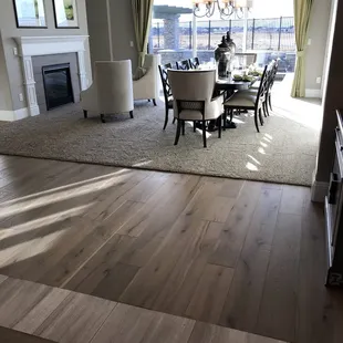 a dining room with hardwood floors