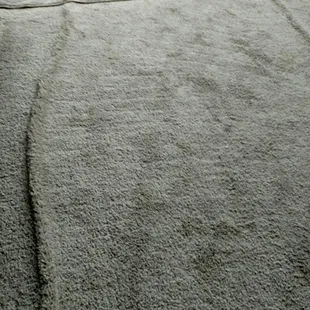 Bunched up carpet.