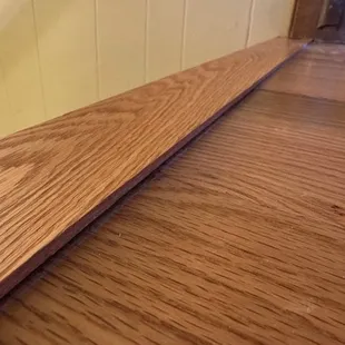Stair nose that is not only a trip hazard going downstairs, but sharp and weird looking!