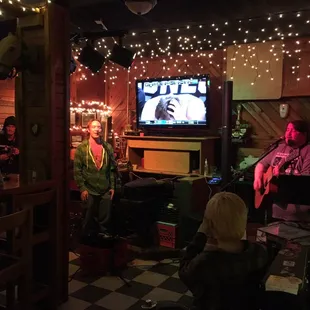 Band playing at open mic (solace in sound)