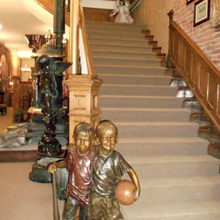 Original grand staircase welcomes guests