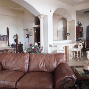 Governor Carr Executive Suite Room 26 on the 2nd floor with King Bed, Private Bath, Jacuzzi for Two, Fireplace, Large Screen TV and couch.