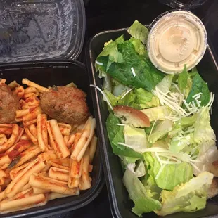 a salad and meatballs