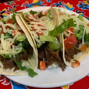 a plate of tacos