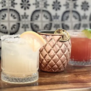 Paloma, Mezcal Mule, and Strawberry Margarita.