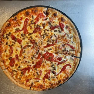 a pizza with pepperoni and cheese