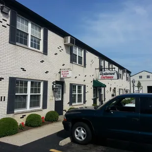 a truck parked in front of the building