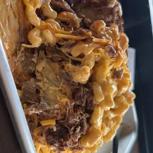 The wobbling carriage with a side of mac n cheese on top.