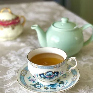 a teapot and a cup of tea