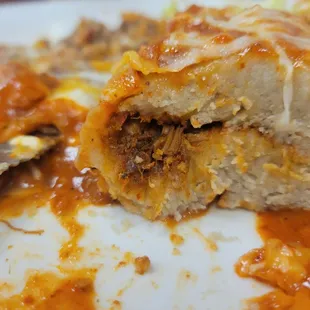 Hardly any flavorful meat and mushy masa.