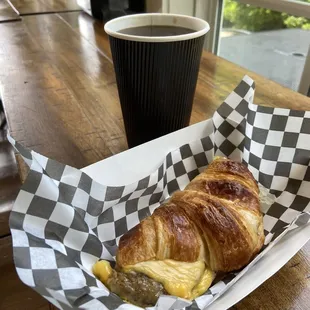 Sausage Egg &amp; Cheese on Croissant w 16 oz Americano. $12.68 + tip
