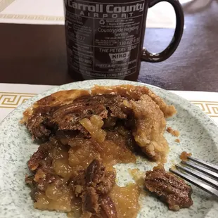 a plate of food and a cup of coffee