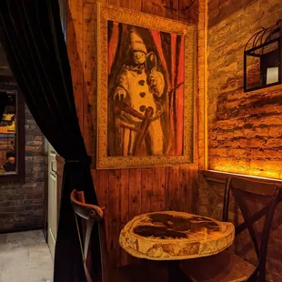 a table and chairs in a rustic setting