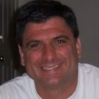 John B.